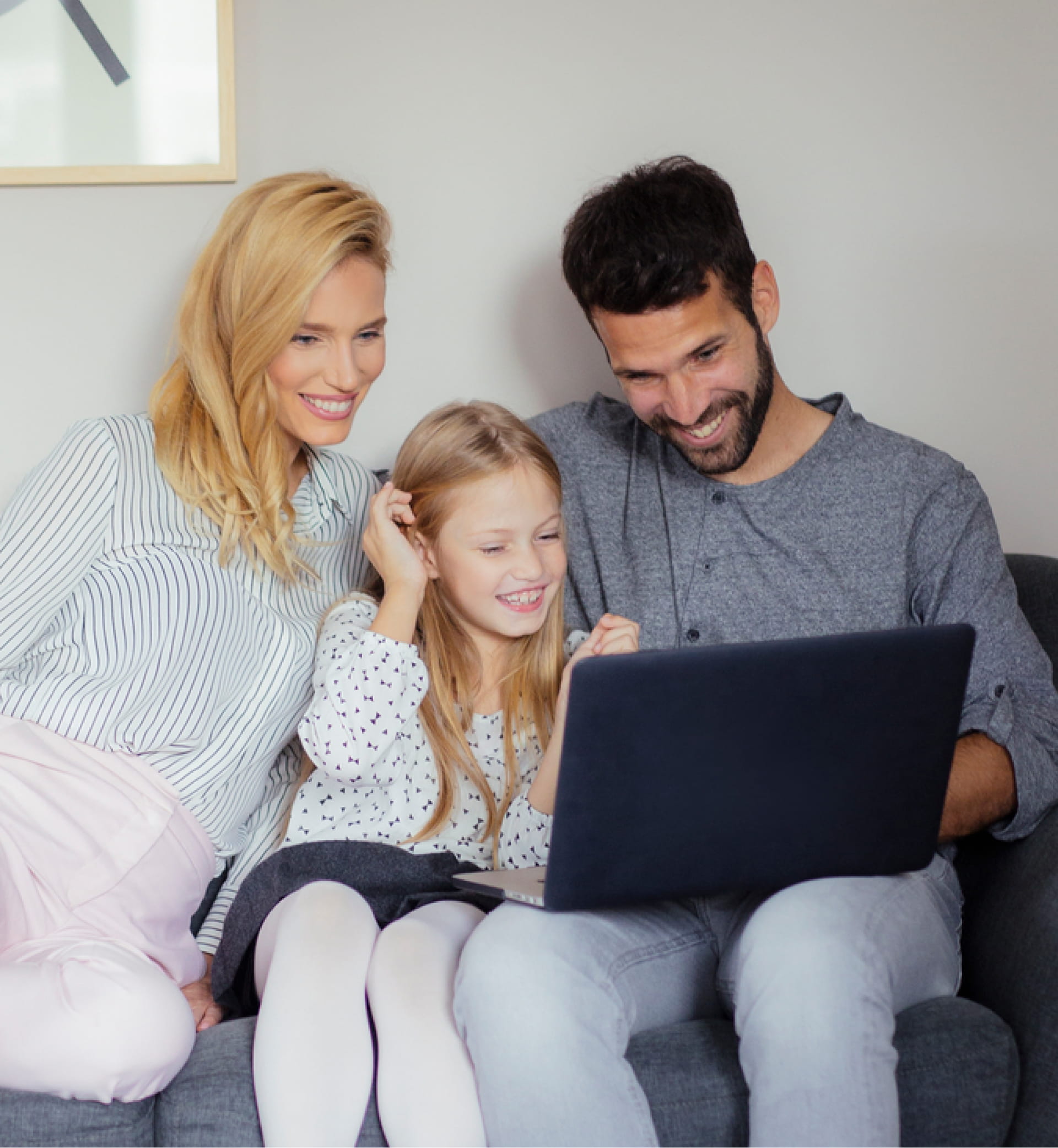 Family looking at a computer